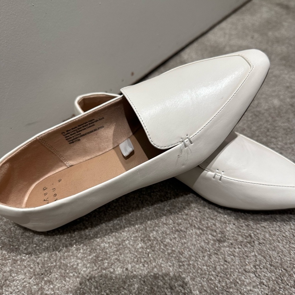 Cute white flats, never used.
